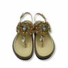 Sandalias beige con joyas en empeine de Inés Palliser.
