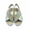 Sandalias cruzadas de piel color dorado brillo y mate, cierre con velcro y suela súper cómoda y ligera de cuña. De Imac para mujer.