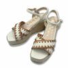 Sandalias blancas de piel con perfil bordado y suela de yute en cuña con plataforma de Kanna.