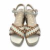 Sandalias blancas de piel con perfil bordado y suela de yute en cuña con plataforma de Kanna.