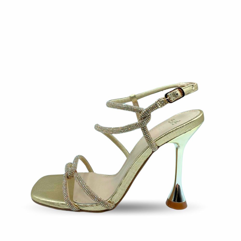 Sandalias doradas con cordones brillos y tacón de copa de Exé.