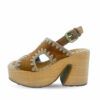 Sandalias de ante marrón con costuras y tacón plataforma de rafia de la nueva colección de Mou.